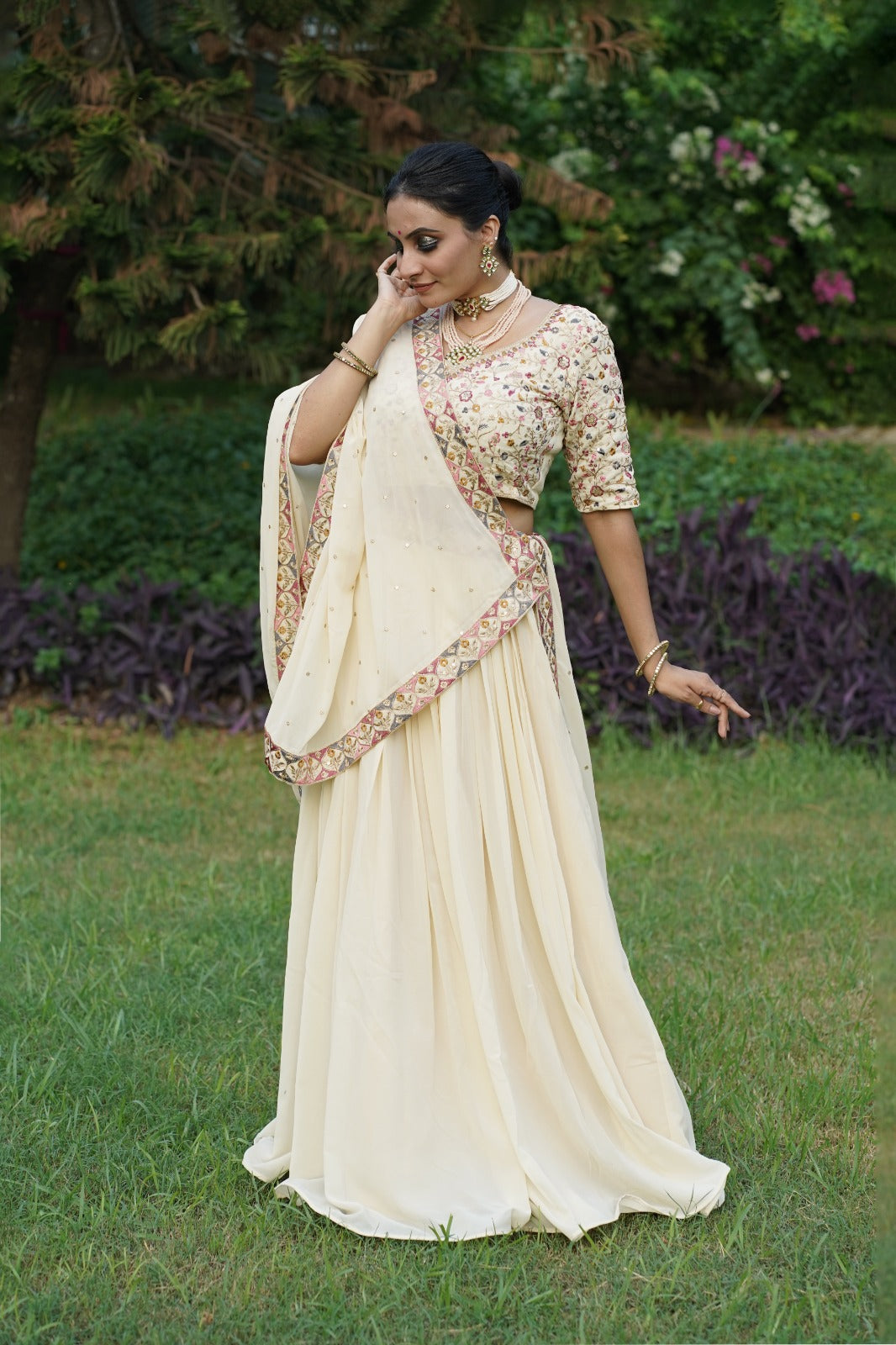 Capture Hearts in Off-White: Exquisitely Embroidered Lehenga Choli with Shimmering Sequins