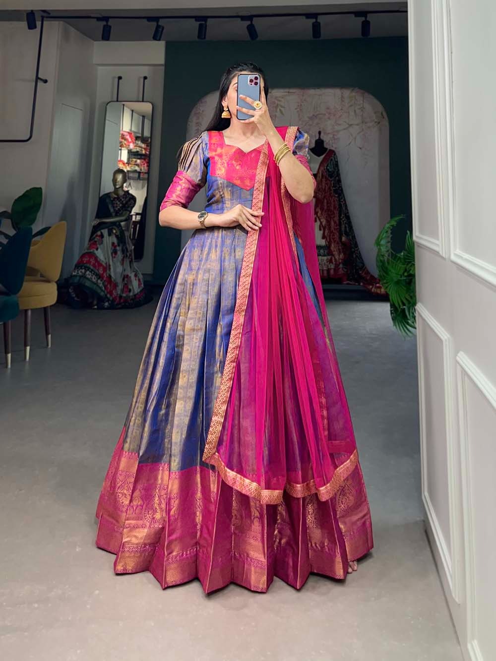 Kanjivaram gown with a graceful net dupatta