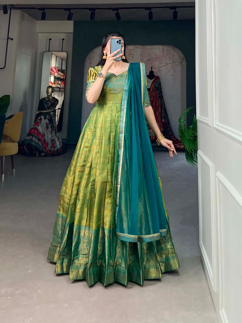 Kanjivaram gown with a graceful net dupatta