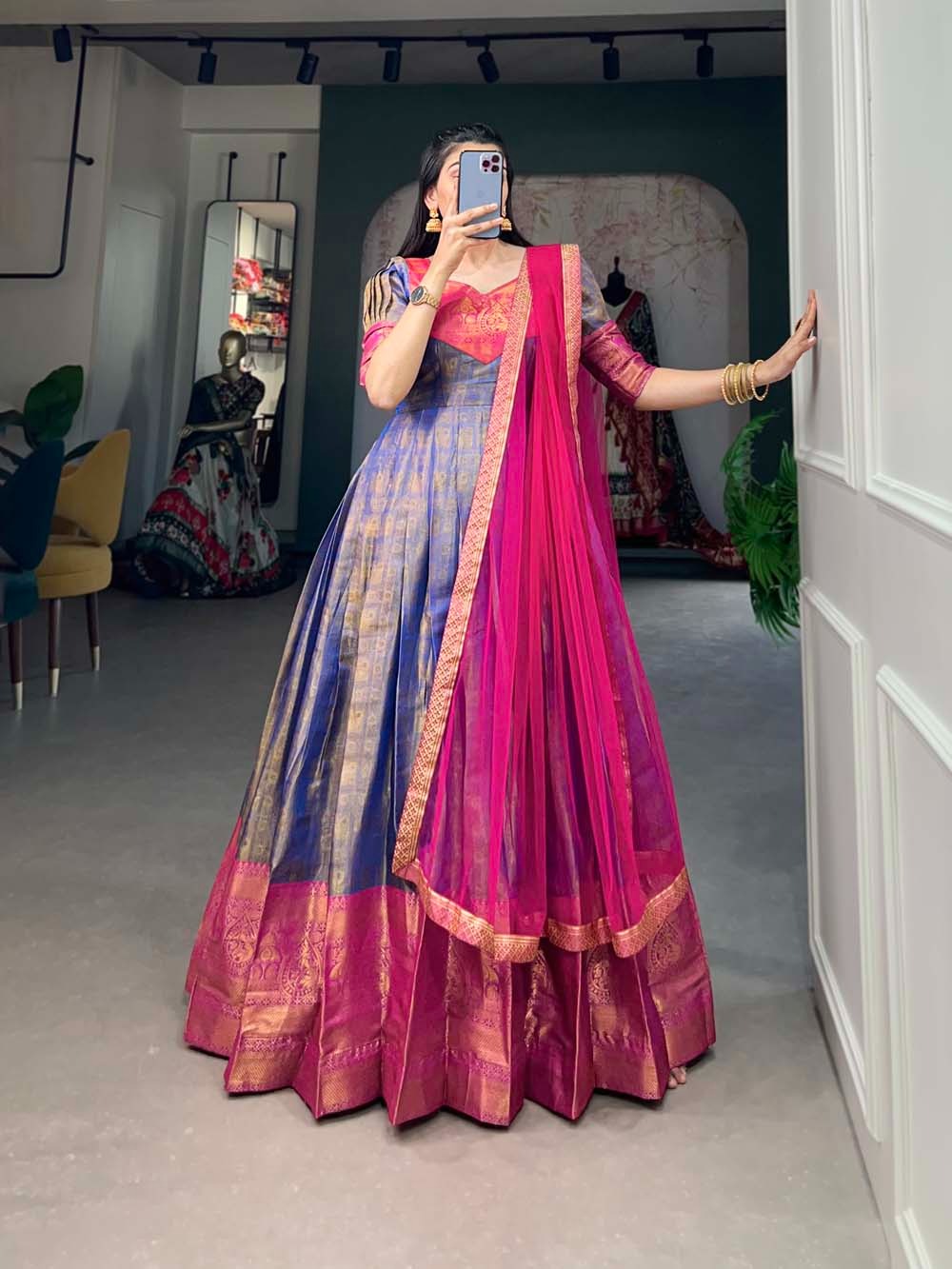 Kanjivaram gown with a graceful net dupatta